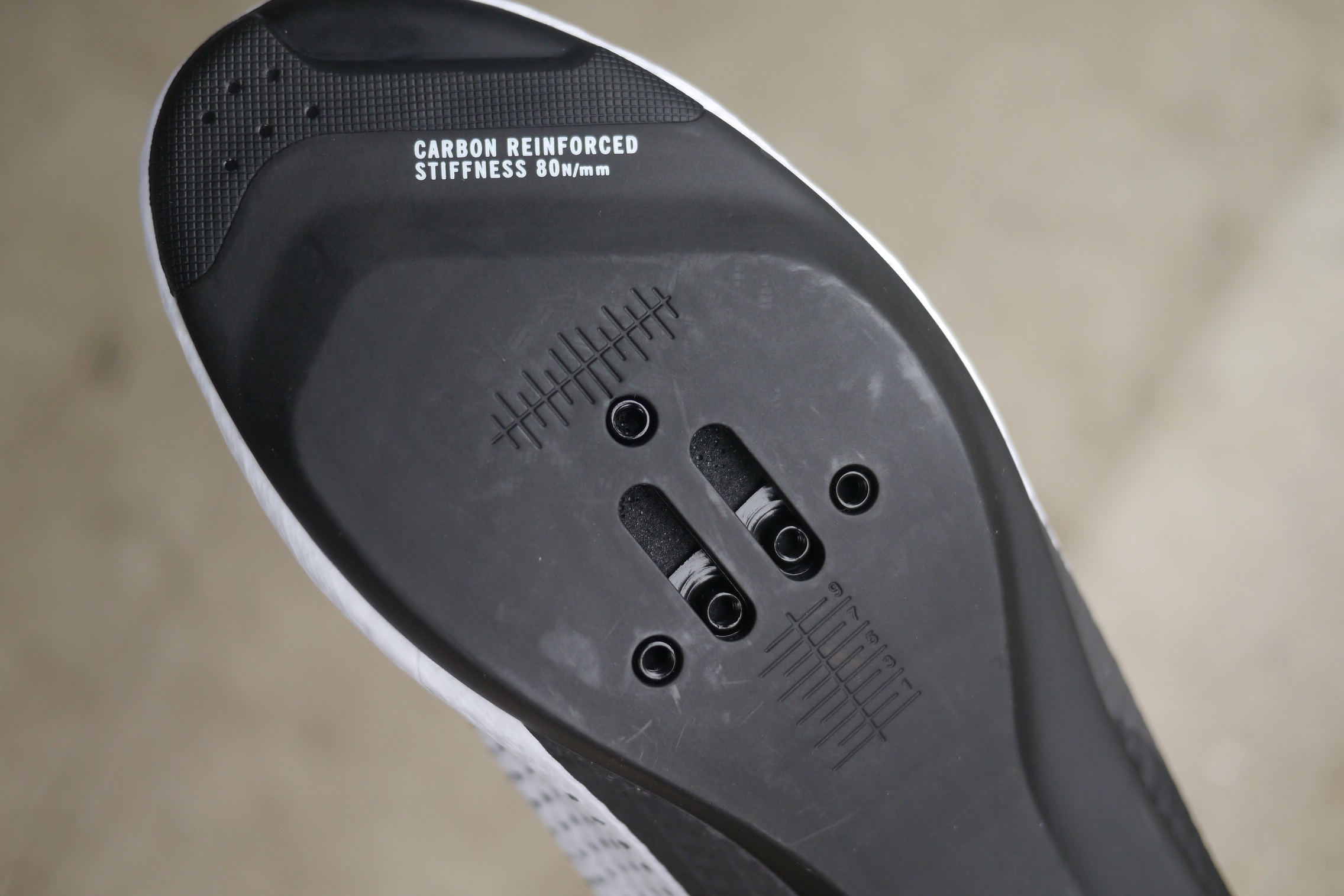 Giro Cadet road bike shoes sole detail showing both 3-bolt and 2-bolt cleat compatibility