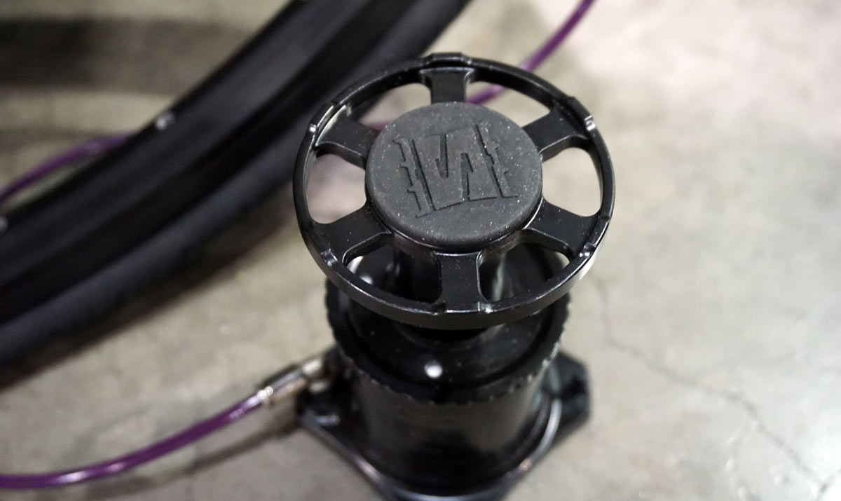 Stompump mini foot pump fits on your frame, fills big bike tires 3x faster